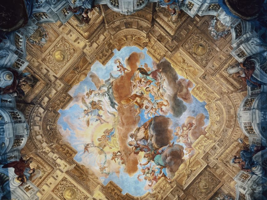 A stunning Baroque fresco depicting mythological figures ascending in a dramatic celestial scene.